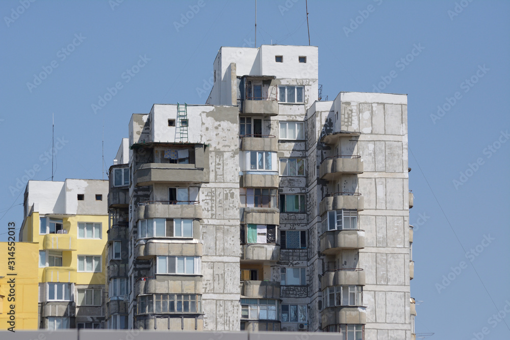 A block of appartment buildings in run down contition