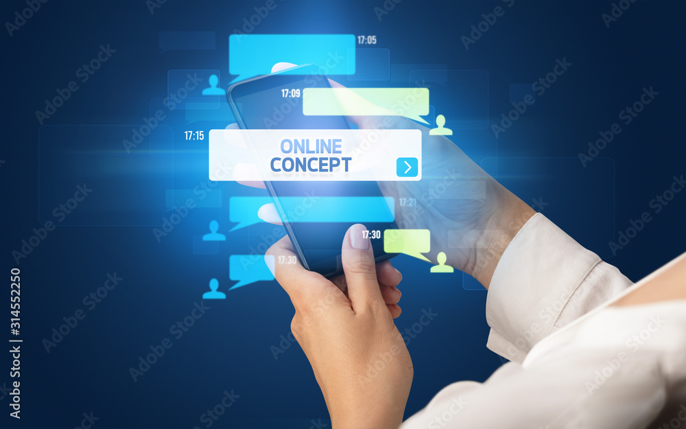 Female hand typing on smartphone with ONLINE CONCEPT inscription, social networking concept Female hand typing on smartphone with ONLINE CONCEPT inscription, social networking concept