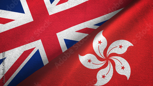 United Kingdom and Hong Kong two flags textile cloth, fabric texture photo