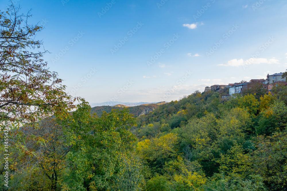 Autumn mountain view of Kakheti region of Georgia. Autumn leaves and trees around Sighnaghi town. Autumn mountain view of Kakheti region of Georgia. Autumn leaves and trees around Sighnaghi town.