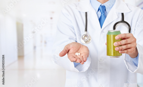 doctor hands holding a soda drink can and saccharin