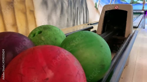 bowling ball rolls out for other players