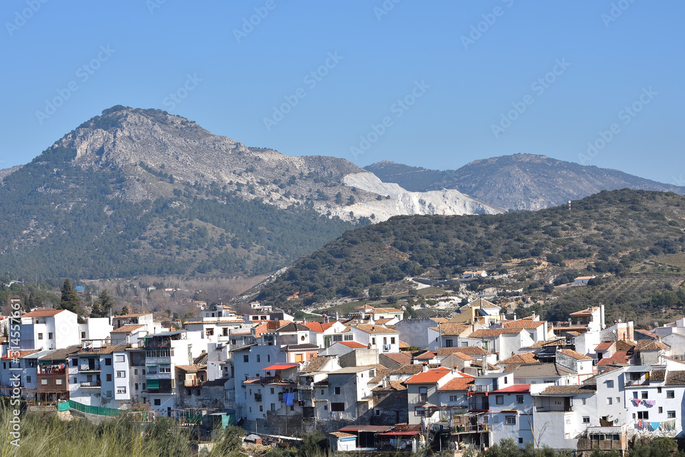 View of the Granada town of Huétor Santillán in the natural park of the Sierra de Huétor