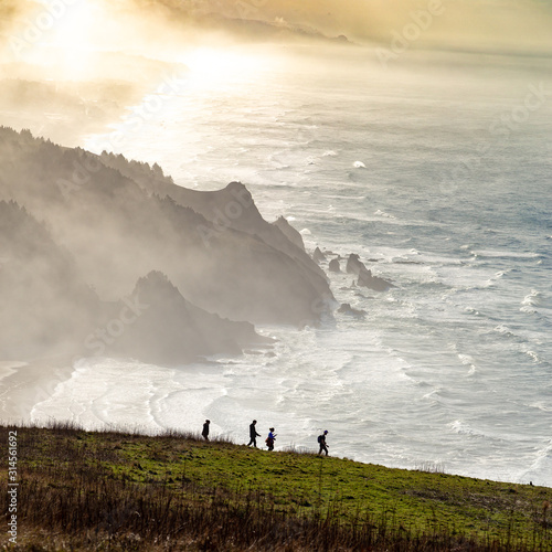 Silhouetted Hikers - Morning On The Oregon Coast