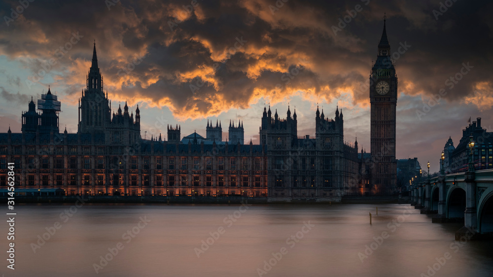Majestic landscape image of Big Ben and Houses of Parliamnet in London during vibrant epic sunset