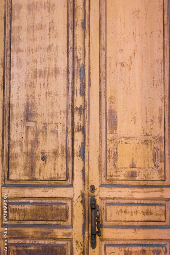 old wooden door of an ancient house old wooden door of an ancient house