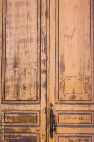 old wooden door of an ancient house