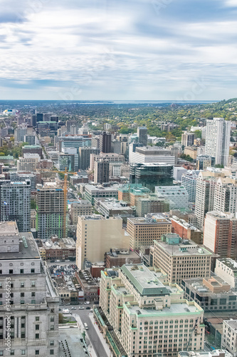 Montreal in Canada, aerial view with modern monuments, typical roofs and buildings
