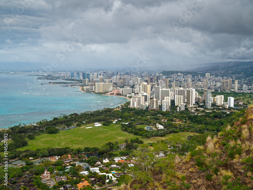 View of Honolulu from Diamond Head Park under a stormy sky