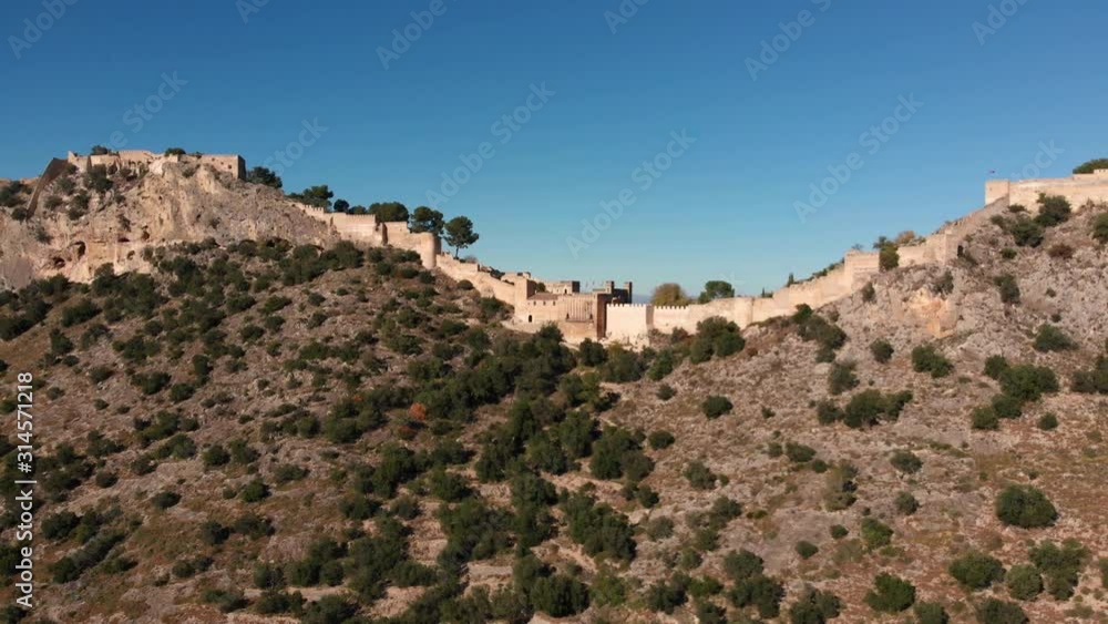 Aerial panoramic pan from an angle of an old medieval castle from afar Aerial panoramic pan from an angle of an old medieval castle from afar