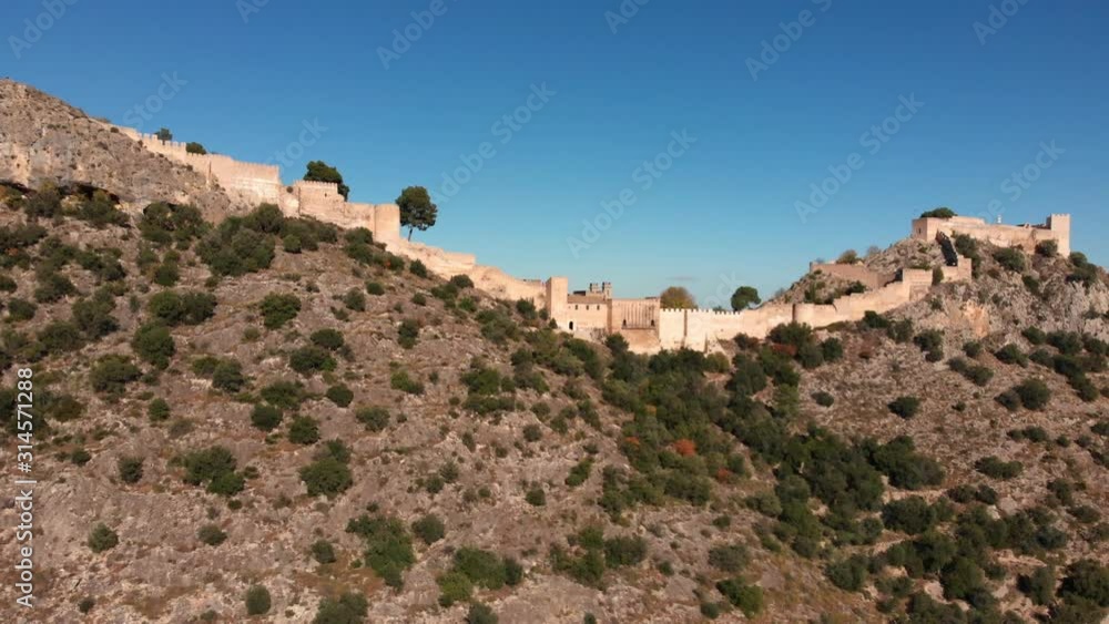 Aerial Fly away landscape view from an old medieval castle on a rocky mountain close Aerial Fly away landscape view from an old medieval castle on a rocky mountain close