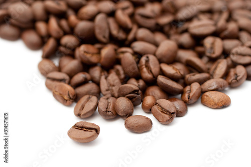 Close up shot of coffee beans on white background