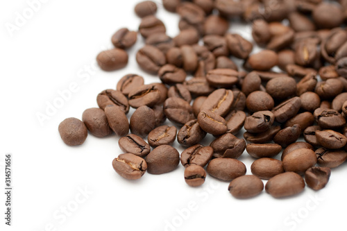 Close up shot of coffee beans on white background