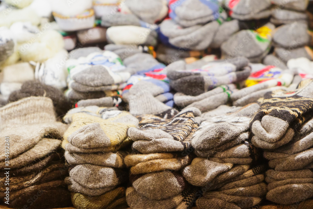 Many woolen socks on the table. Many woolen socks on the table.