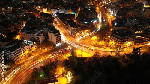 Aerial drone night shot of illuminated cityscape of Athens, Attica, Greece