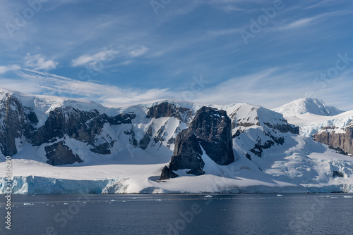 Antarctic landscape with glacier and mountains © Alexey Seafarer