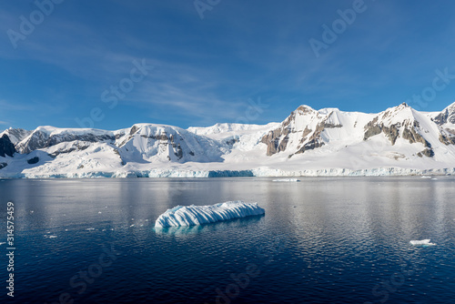Valokuva Antarctic landscape with iceberg at sea