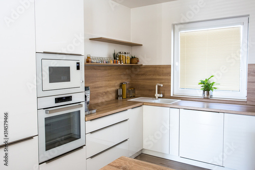 Modern kitchen white colour and wood