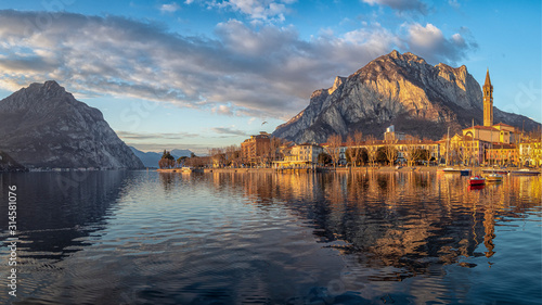 Beautiful sunset light over the city of Lecco (Italy) photo