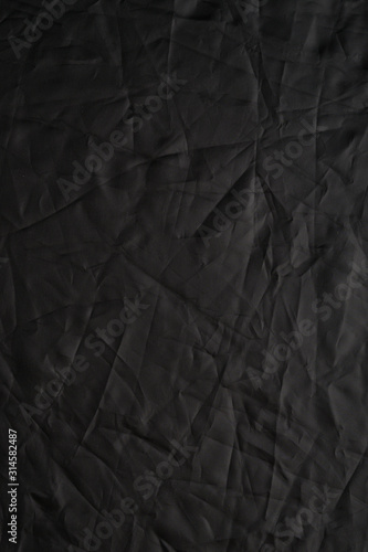 Wallpaper Mural Texture of crumpled black fabric with a blue tint. Creative vintage background. Black flag. Torontodigital.ca