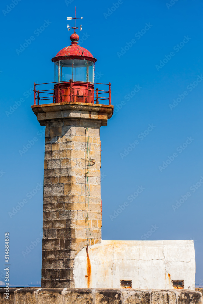 Beautiful early spring day at the historical Felgueiras Lighthouse built on 1886 and located at Douro river mouth in Porto city Beautiful early spring day at the historical Felgueiras Lighthouse built on 1886 and located at Douro river mouth in Porto city