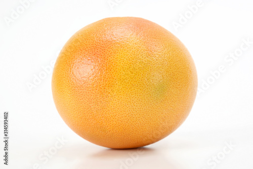 Citrus fruit. Fresh grapefruit on white background