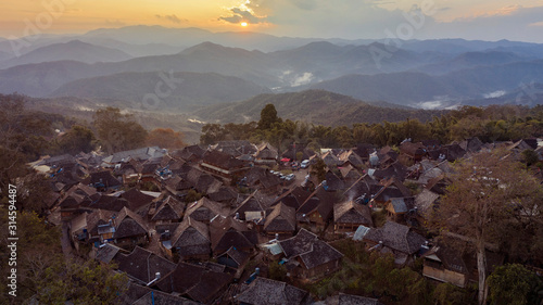 Aerial view of the remote Wengji Dai village in Lancang, Yunnan - China photo