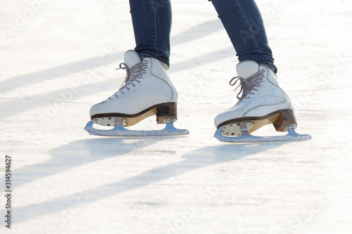 girl ice skating on an ice rink