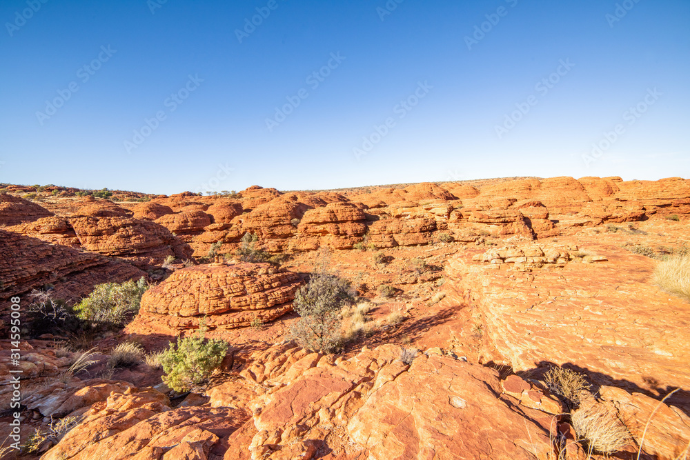 Lookout over the canyon of red arid earth Lookout over the canyon of red arid earth