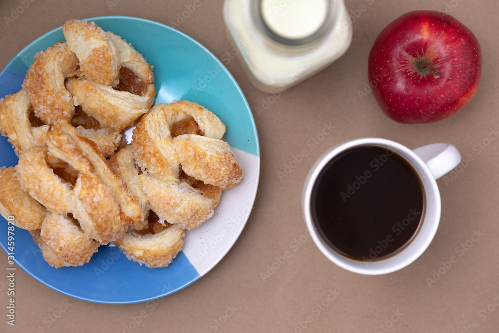 Breakfast with apple danish pastries and coffee Breakfast with apple danish pastries and coffee