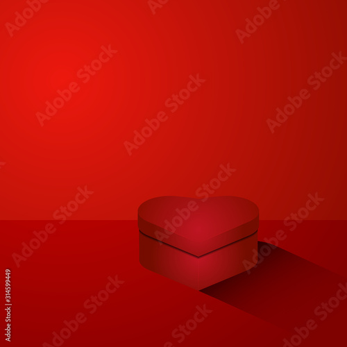 Heart shaped box on red background