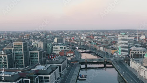 Aerial fly through shot. This drone footage of Dublin City centre shot in 4K travels along the river Liffey throughout the city centre. photo