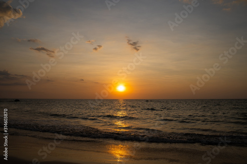 beautiful sunset at Na Tai Beach Phang Nga © Sunanta