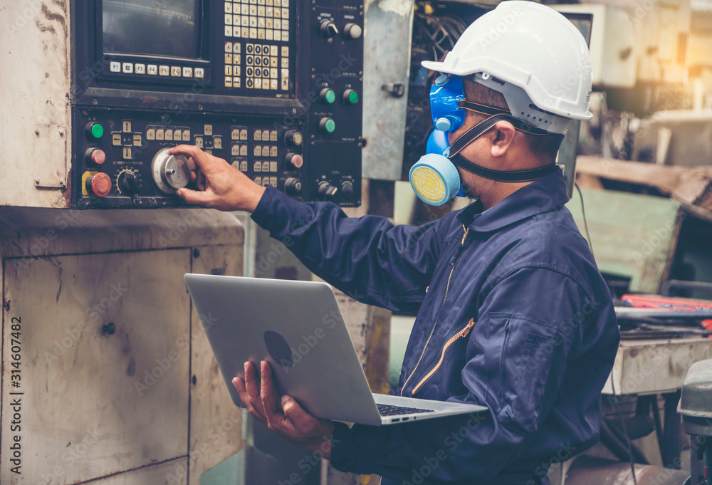 Chemical engineers wear helmet hat, and put chemical-resistant masks, carry laptops, inspect and control chemicals in the factory. Chemical engineers wear helmet hat, and put chemical-resistant masks, carry laptops, inspect and control chemicals in the factory.