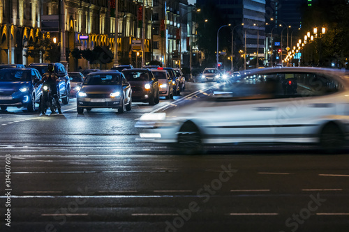 car traffic at night on the street. illuminated cityscape night view
