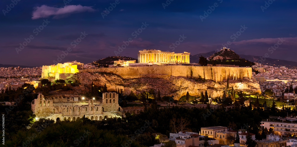 Panorama of Athens with Acropolis hill at dramatic sunset.