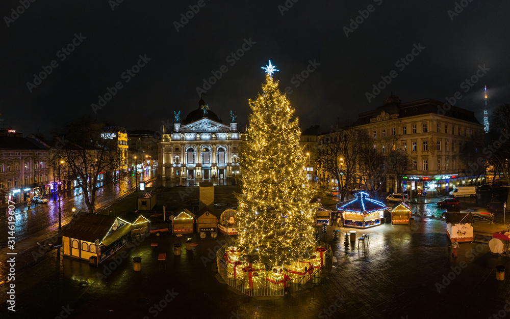 Christmas tree near Opera House in Lviv, Ukraine. View from drone