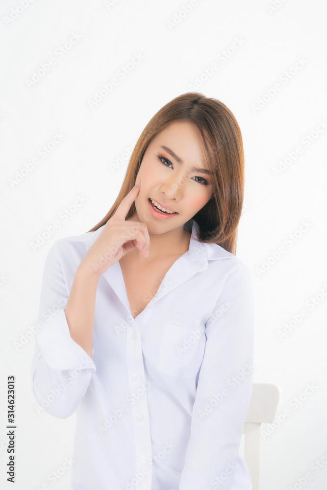 Asian woman portrait with perfect skin and wearing a white shirt in profile isolated on white background. Asian woman portrait with perfect skin and wearing a white shirt in profile isolated on white background.