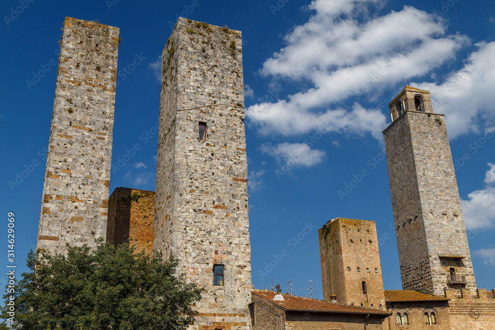 View to medieval towers of San Gimignano old town, Italy