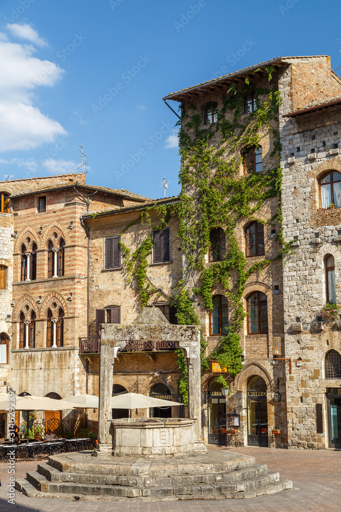 SAN GIMIGNANO / ITALY - JULY 2015: Square in the historic centre of San Gimignano town, Italy