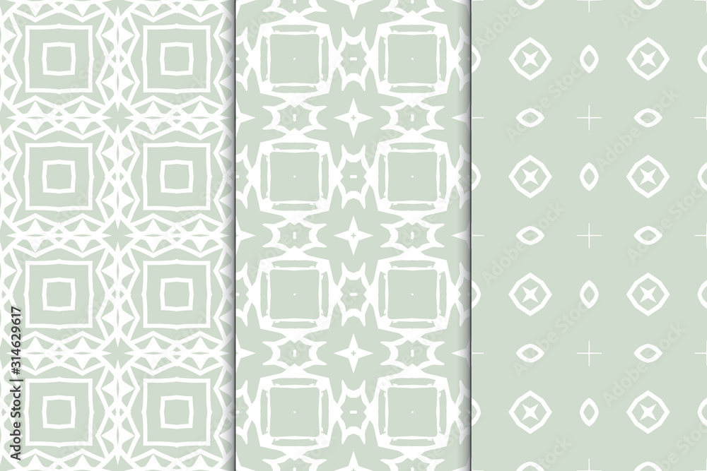 Set of seamless patterns. Stylish graphic patterns on a colored background. Template art textures for printing on fabric, wrapping paper, Wallpaper. Vector ornament Set of seamless patterns. Stylish graphic patterns on a colored background. Template art textures for printing on fabric, wrapping paper, Wallpaper. Vector ornament