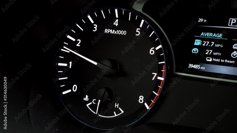 RPM indicator on the gauge cluster of a car RPM indicator on the gauge cluster of a car