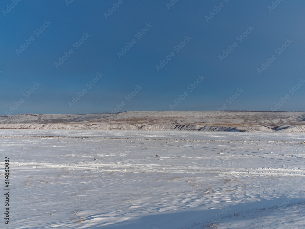 view of the steppe on a clear Sunny winter day