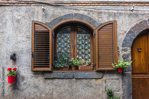 Residential building in the historic part of Randazzo city on Sicily Island in Italy photo