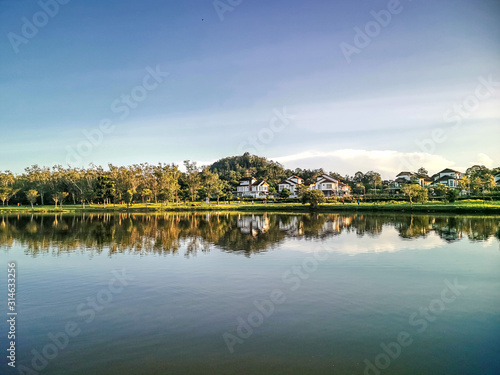 Darulaman Lake in Jitra, Kedah, Malaysia is a perfect place to enjoy a cool evening just paddling in the lake or riding the buggies around. It is a very good place for boating and relaxation. photo