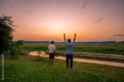 Natural panoramic nature background of rice fields, blown through the blurred cool air during the day, often seen in rural areas and scenic spots along the road.