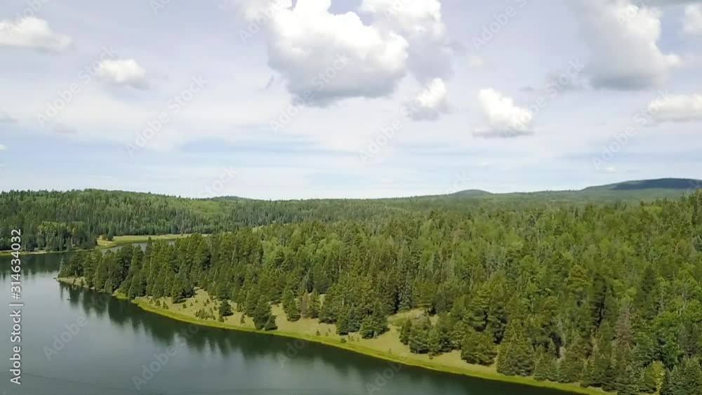 This 1080p video shows a beautiful mountain lake. Great for setting the scene or showing off the outdoors. This 1080p video shows a beautiful mountain lake. Great for setting the scene or showing off the outdoors.