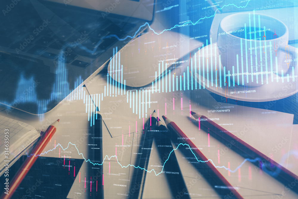 Fototapeta premium Financial graph drawing and table with computer on background. Multi exposure. Concept of international markets.
