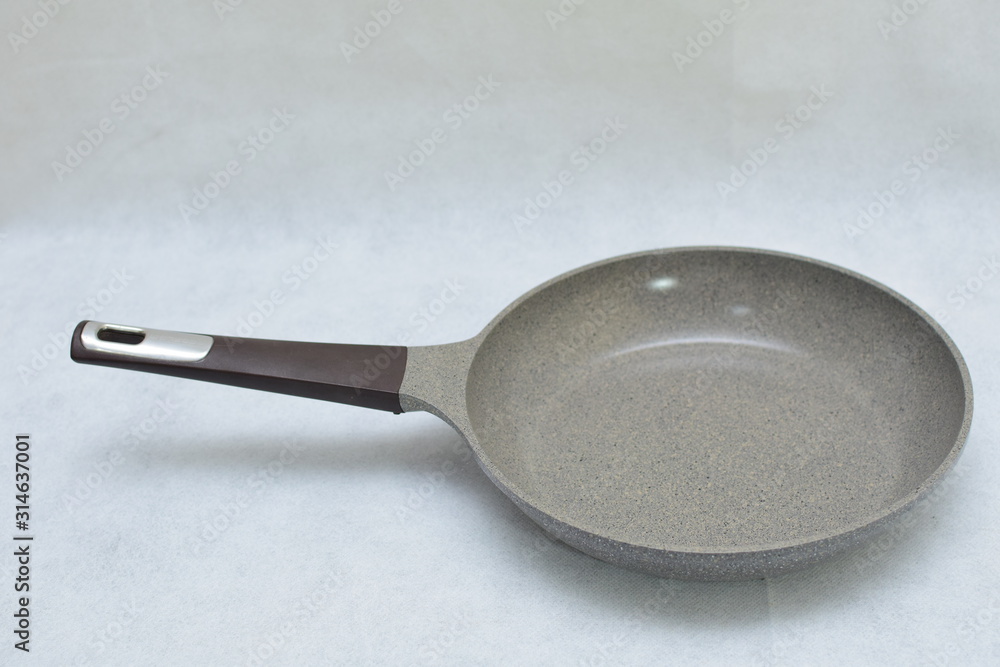 Mock up / design set of elegant and traditional cooking pots and goblet , grey and black made of ceramic isolated on white background Mock up / design set of elegant and traditional cooking pots and goblet , grey and black made of ceramic isolated on white background