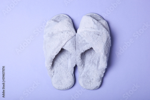 slippers on a colored background top view.